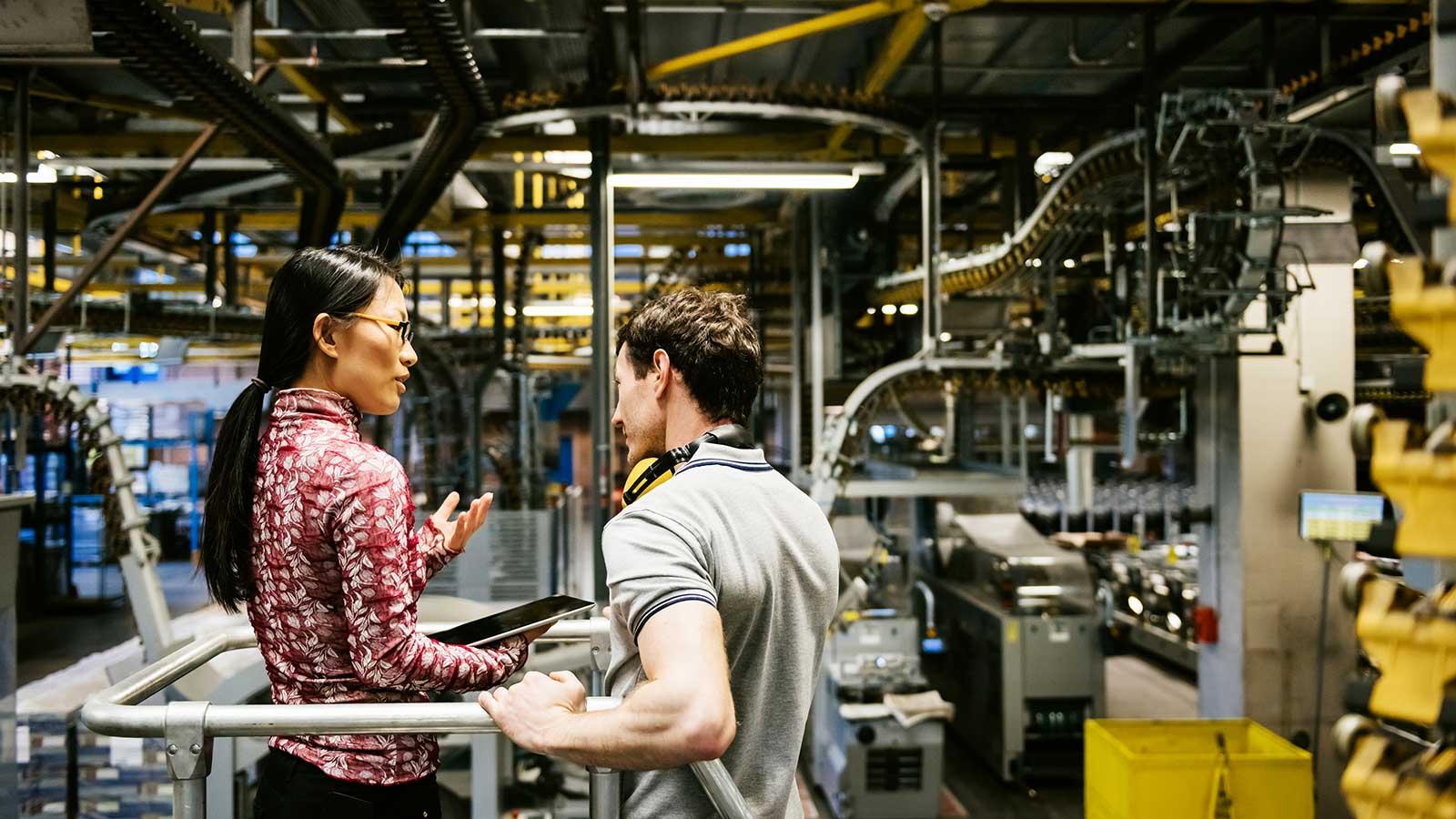 Engineers in a factory representing engineering management cohort at Clarkson university