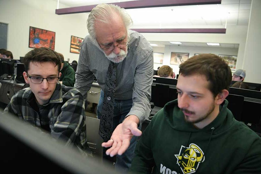 Students and a professor in a computer lab